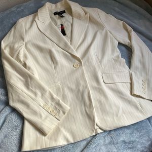 Beautiful cream pinstriped suit.